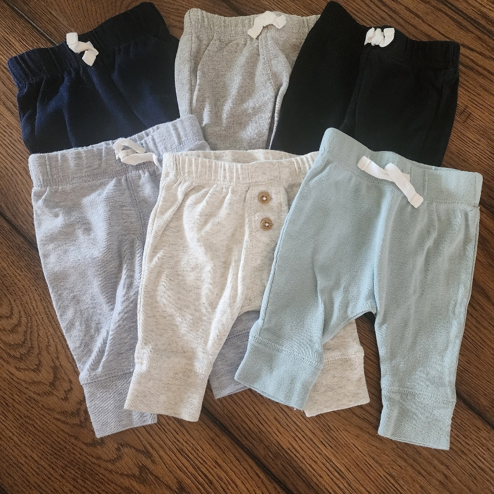 6 pairs of Carrers Newborn Pants